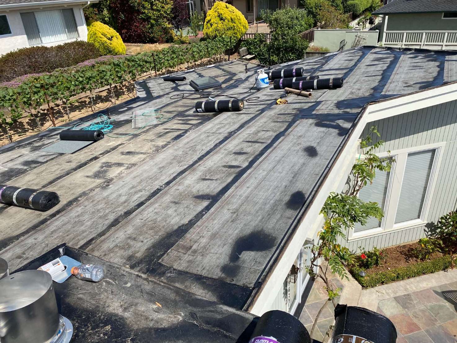 3 Ply Roofing System Being Installed-Smooth Torch