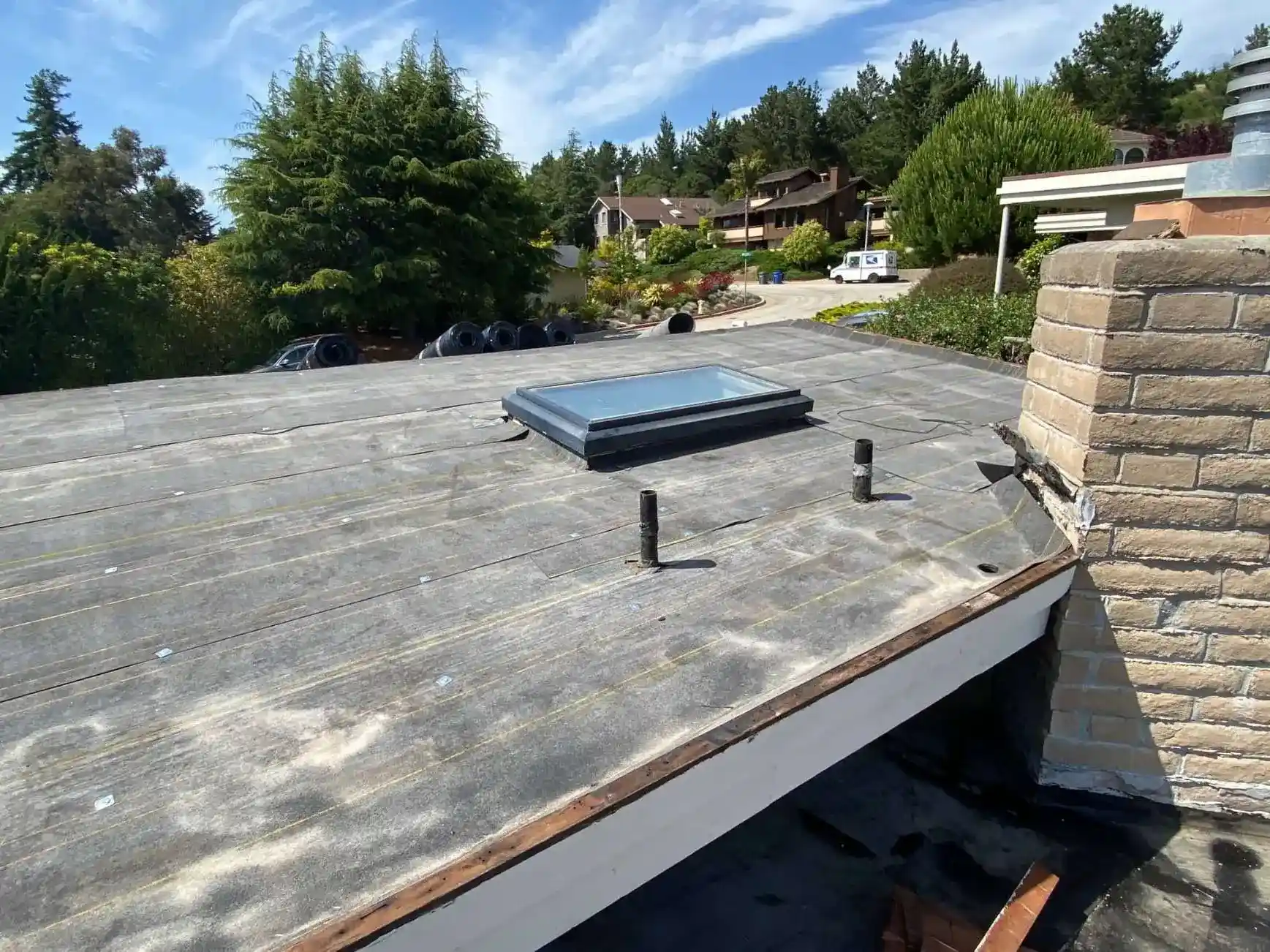 3 Ply Roofing System Being Installed-Based Layer